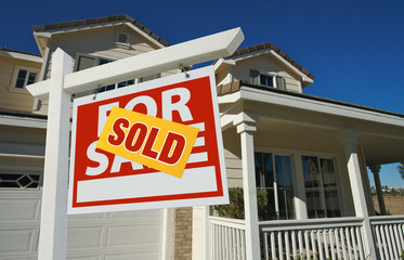 Sold Home For Sale Sign in Front of New House