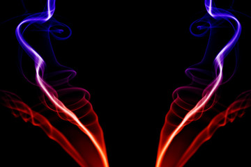 abstract colored smoke in a black background