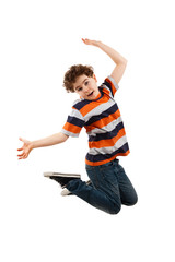 Boy jumping isolated on white background