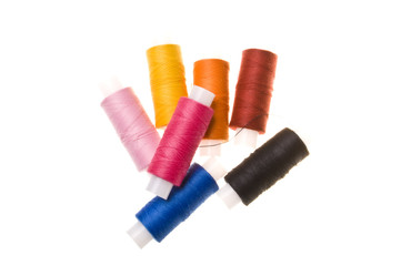 spools of sewing threads isolated on the white