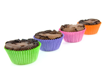 home baked brownie cupcakes over white background