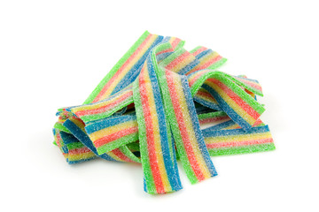 Colorful sour chew candy over white background
