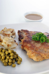 cutlet with organic pea and roasted potato