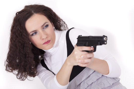 woman shooting from gun