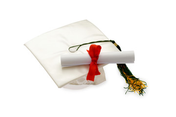 Graduation cap and diploma isolated on white