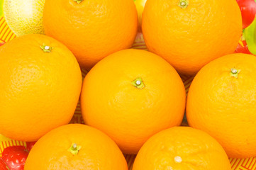 Close up of many oranges on the market