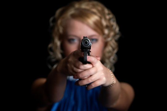 blonde with gun