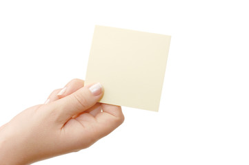 Fototapeta premium Female hand holding a card isolated