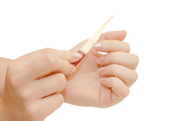 Woman hands and manicure nail file