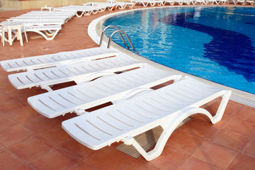 lounge chairs  near the pool
