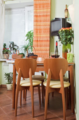 Kitchen Table and chairs with fruit basket
