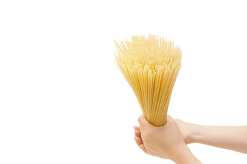spaghetti in the hand isolated on white