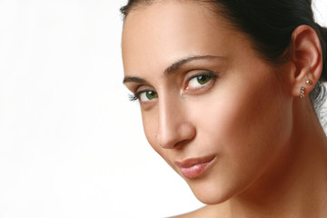 Close-up portrait of young, nice girl with green eyes