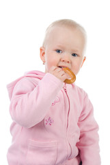 Little girl eating  bagel