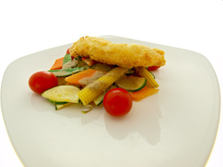 breaded fish fillet with vegetables