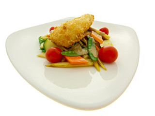 breaded fish fillet with vegetables