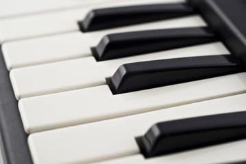 Fototapeta na wymiar Extreme Closeup of piano keyboard