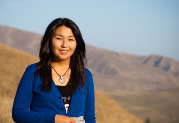 Obraz premium Portrait of a young beautiful asian girl smiling