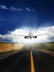 the airplane with the blue sky background.