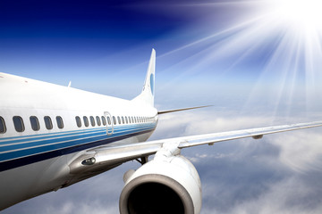 the airplane with the blue sky background.
