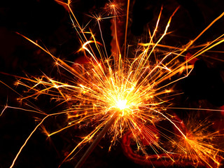 Christmas sparkler on black background