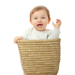 Young baby girl in basket