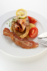 carp fillet on organic bacon and lemon