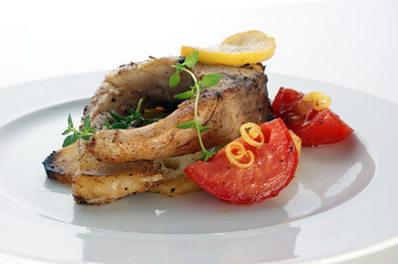 carp fillet on organic potato and lemon