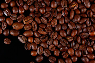 coffee beans on the black glass