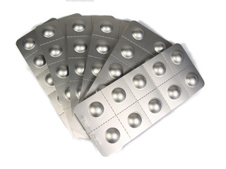 Blisters with pills isolated on white