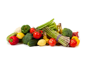 Assorted fruits and vegetables on a white background