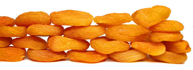 Dry peach slices isolated on white