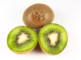 Kiwi with slices isolated on white