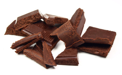 Chocolate pieces and slices isolated on white