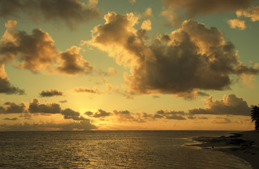 Cloudscape over Ocean and Island at Sunset