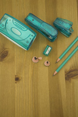 Elevated View a Paper hole punch,stapler,staple remover,pencils