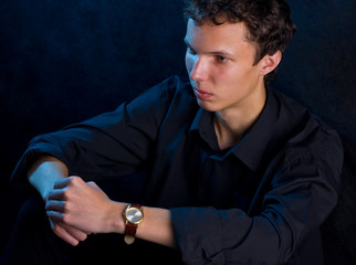 Young man thinking about something