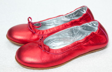 Ballerina shoes isolated on white. © SemA