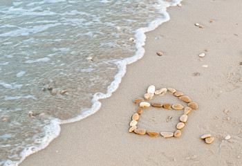 House of stones on the sand