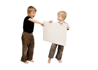 Little boy points excitingly to blank card