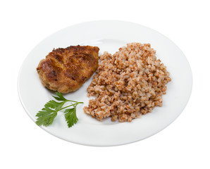 chops with buckwheat on plate