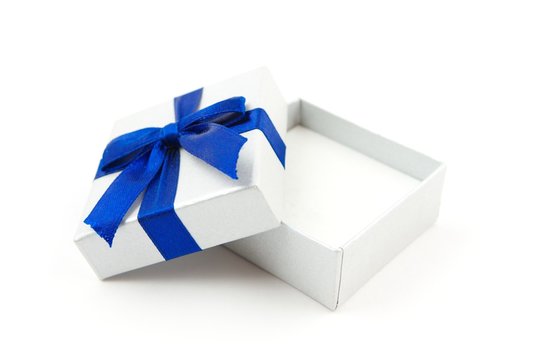 opened gift with blue bow isolated on white
