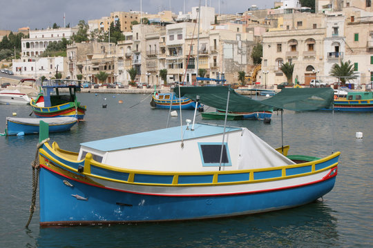 Luzzu fishing vessels in Kalkara Creek Malta