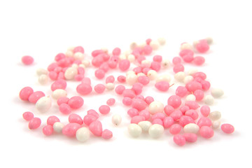Obraz na płótnie Canvas pink and white mice sprinkles over white background