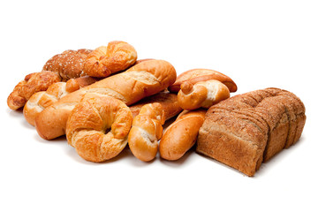 Assorted kinds of breads on a white background