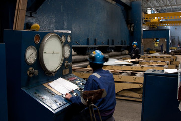 industrial machine for bending metal sheets