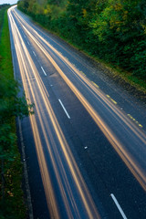 car lights trails on the road