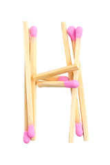 Letter H made of matches isolated on white with clipping path