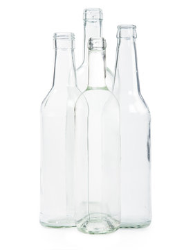 four transparent bottles