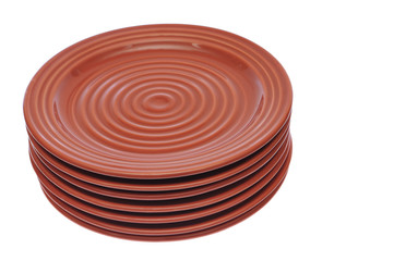 Stacked red brown plates